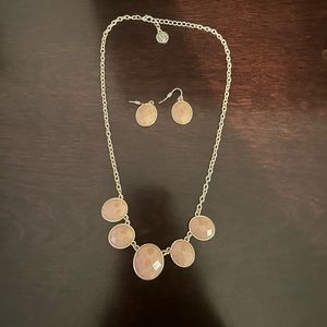 Matching earring and necklace set. Peach/light pink and gold color